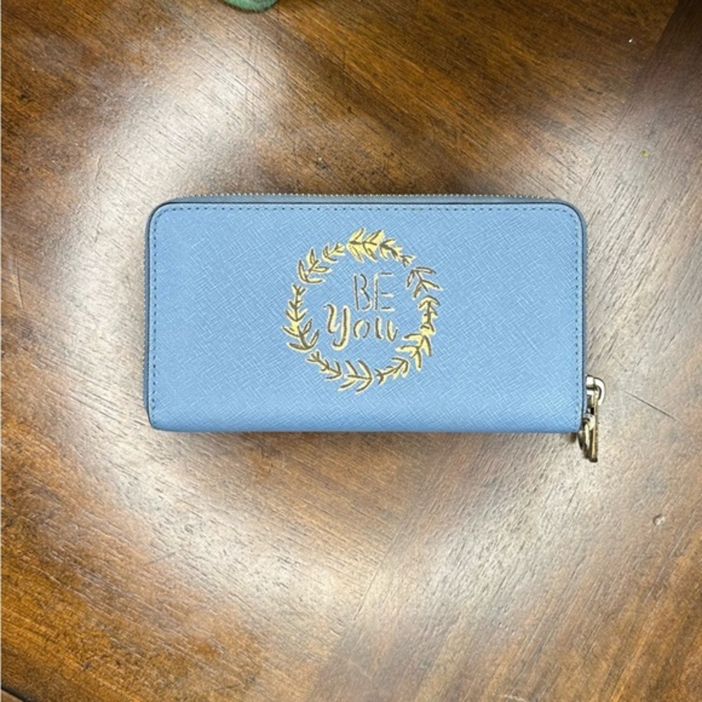 Michael Kors' saffiano leather wallet. Inspirational quote